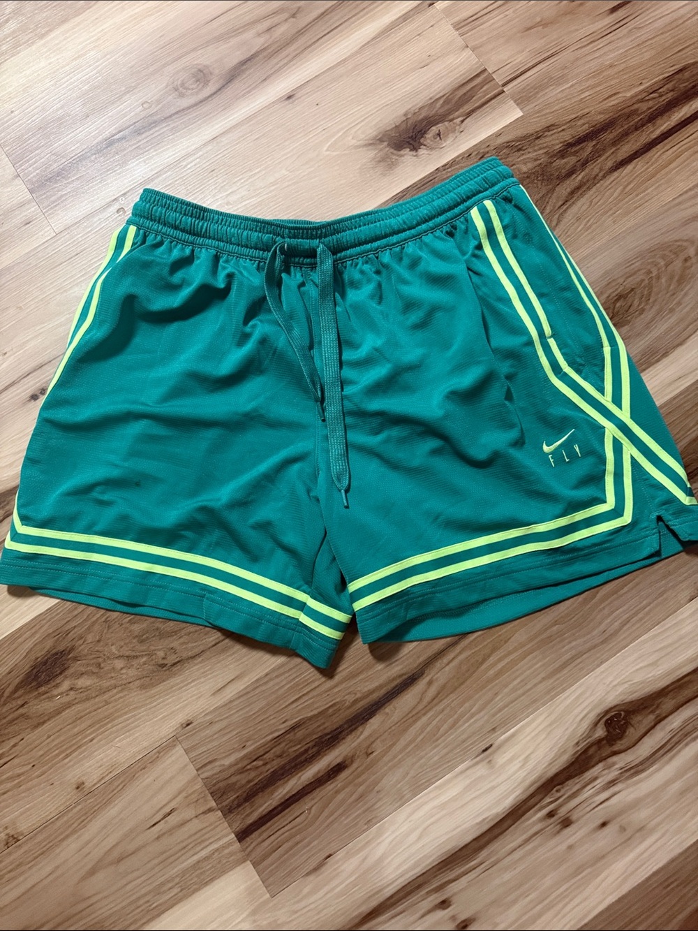 Nike Green Athletic Shorts with Neon Yellow Trim